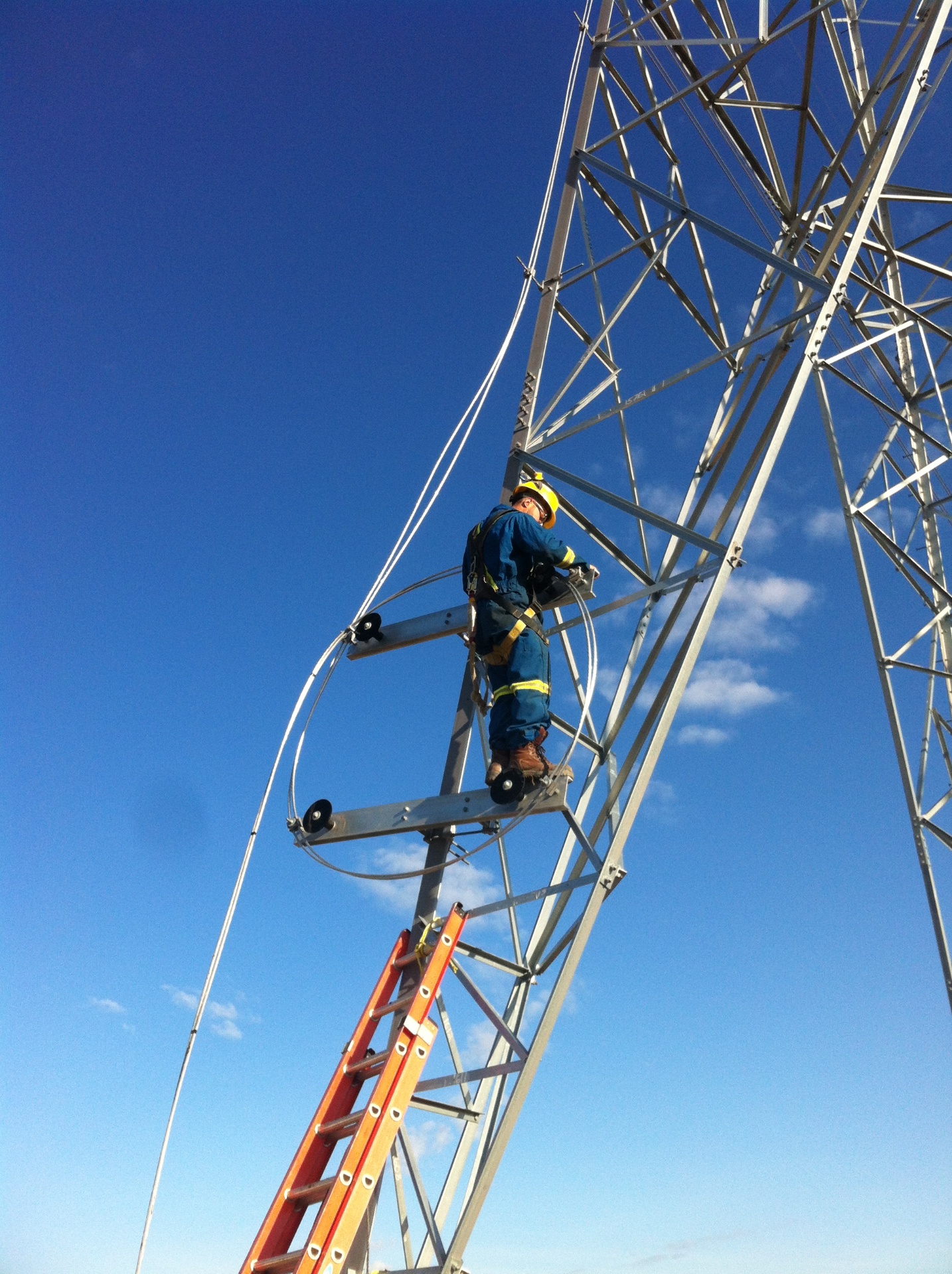 ASI Tech crew working at height on a transmission tower