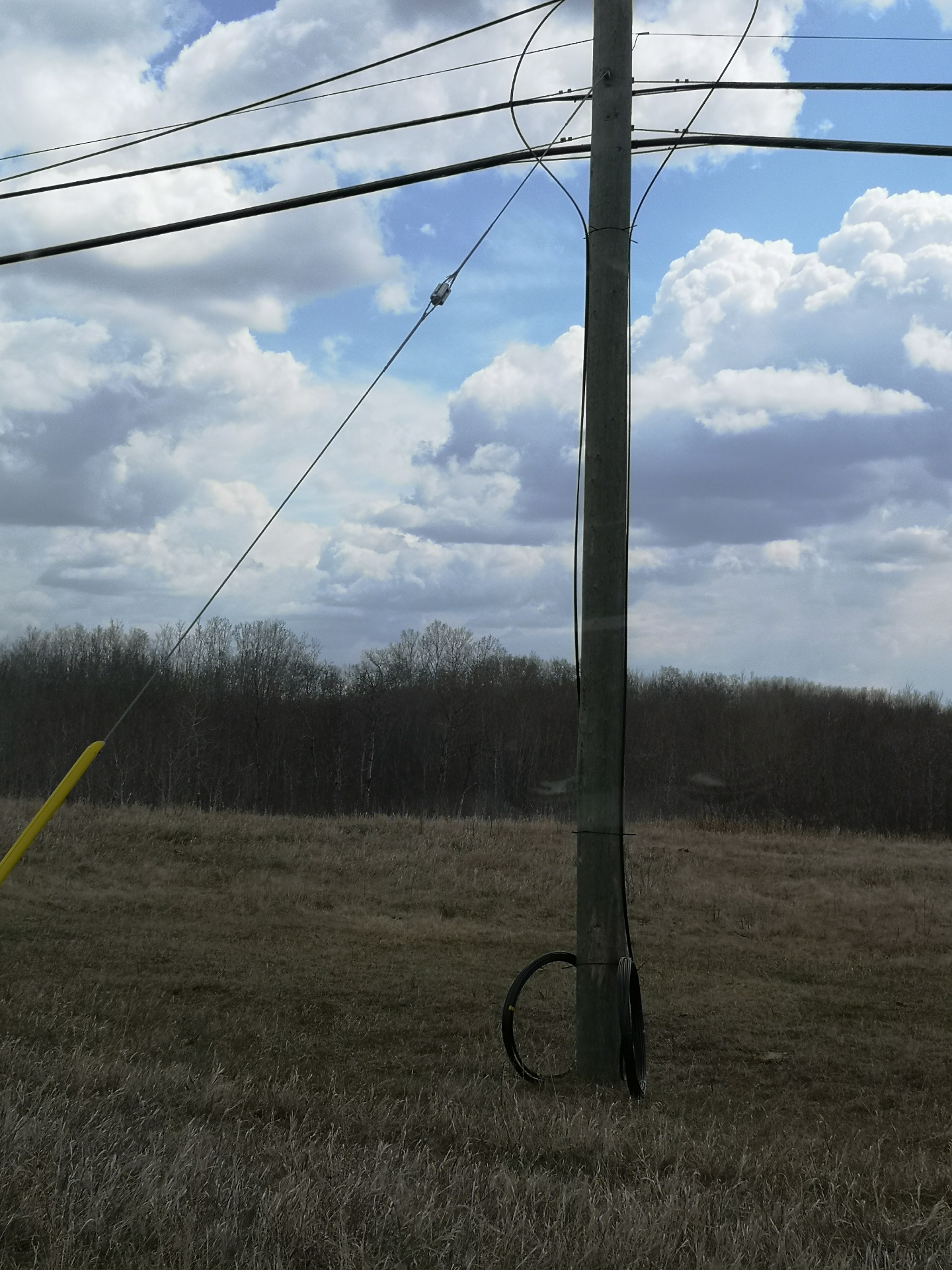 Aerial fiber installation on utility pole